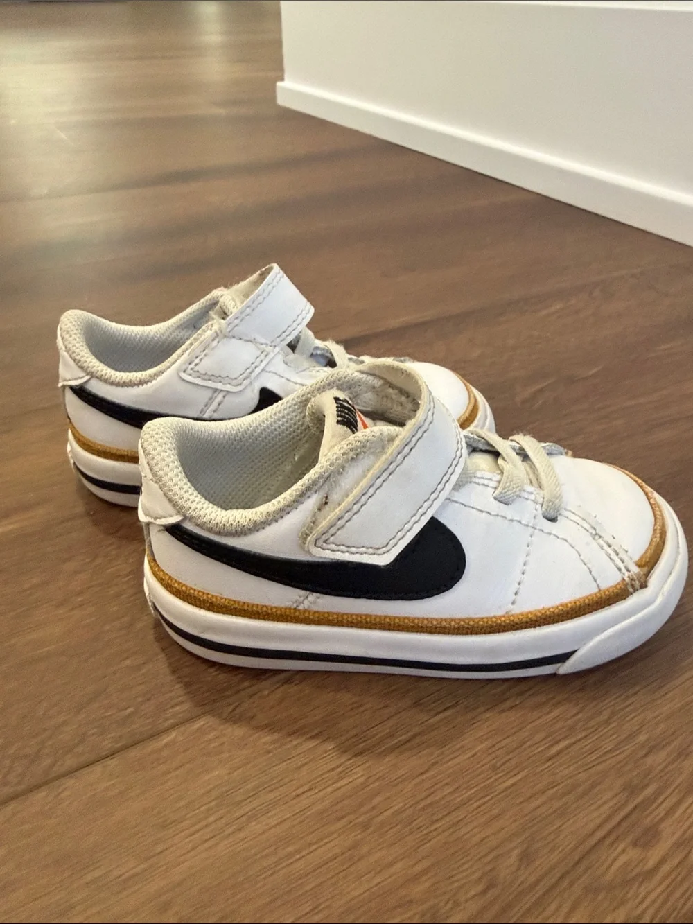 Nike Kids White and Tan Low-Top Sneakers with Black Swoosh